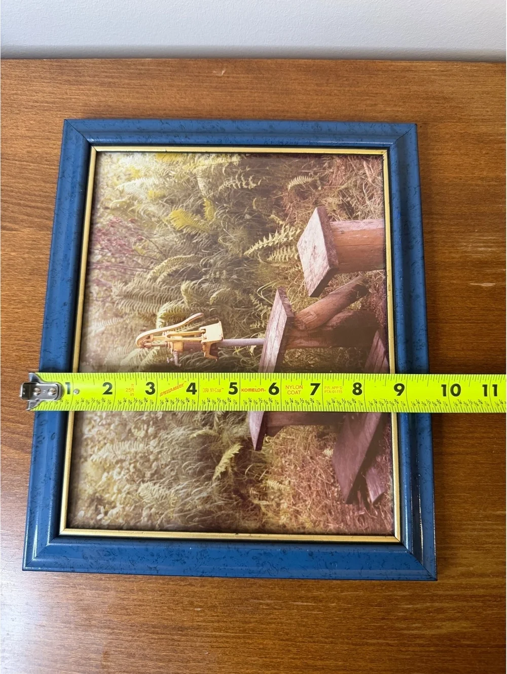 Vintage photograph of water pump/spigot with frame